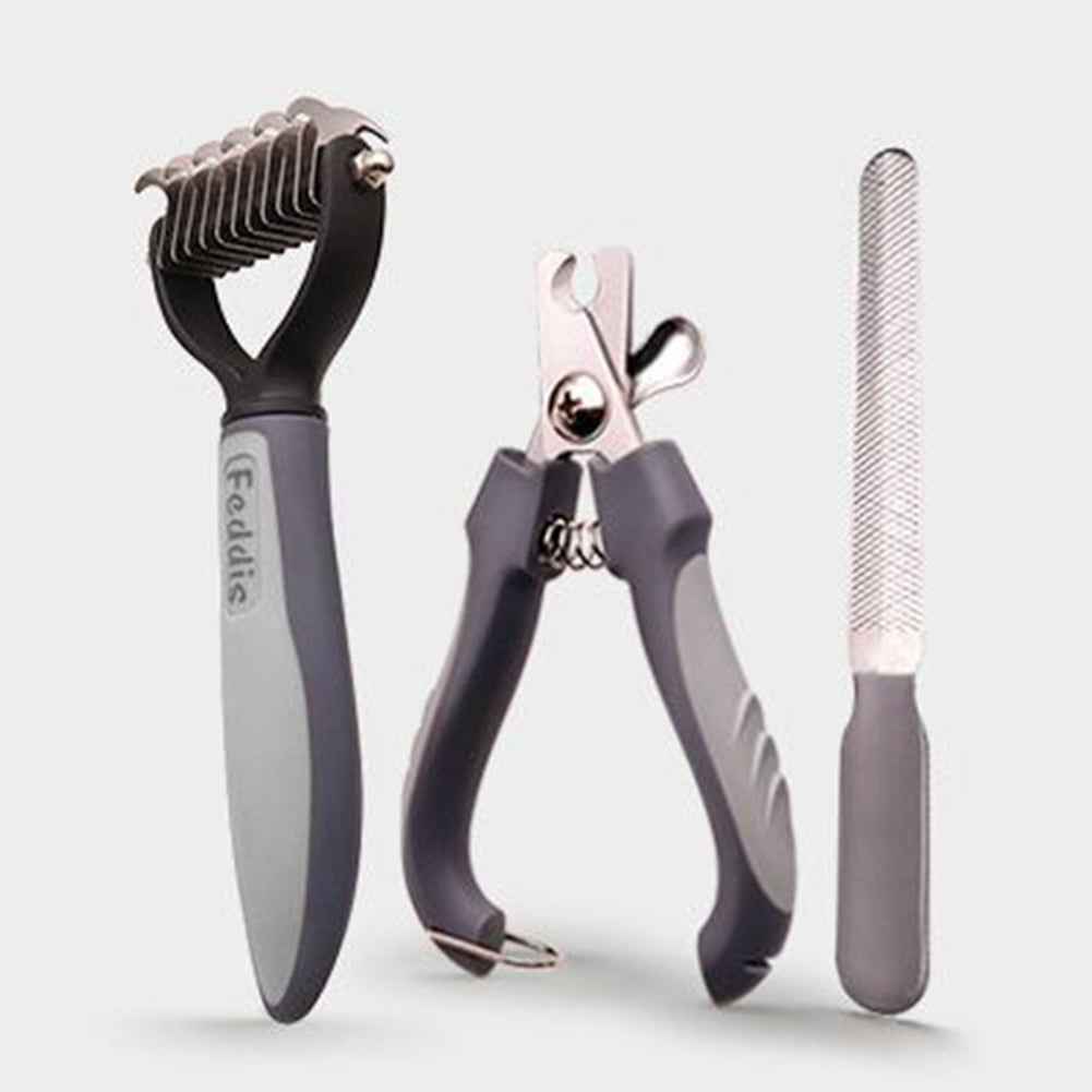 Modern pet grooming tools including nail clipper and brush